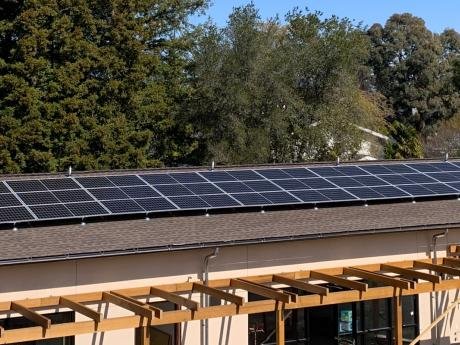 Luxury Beverly Hills home with solar panel installation under California sunshine