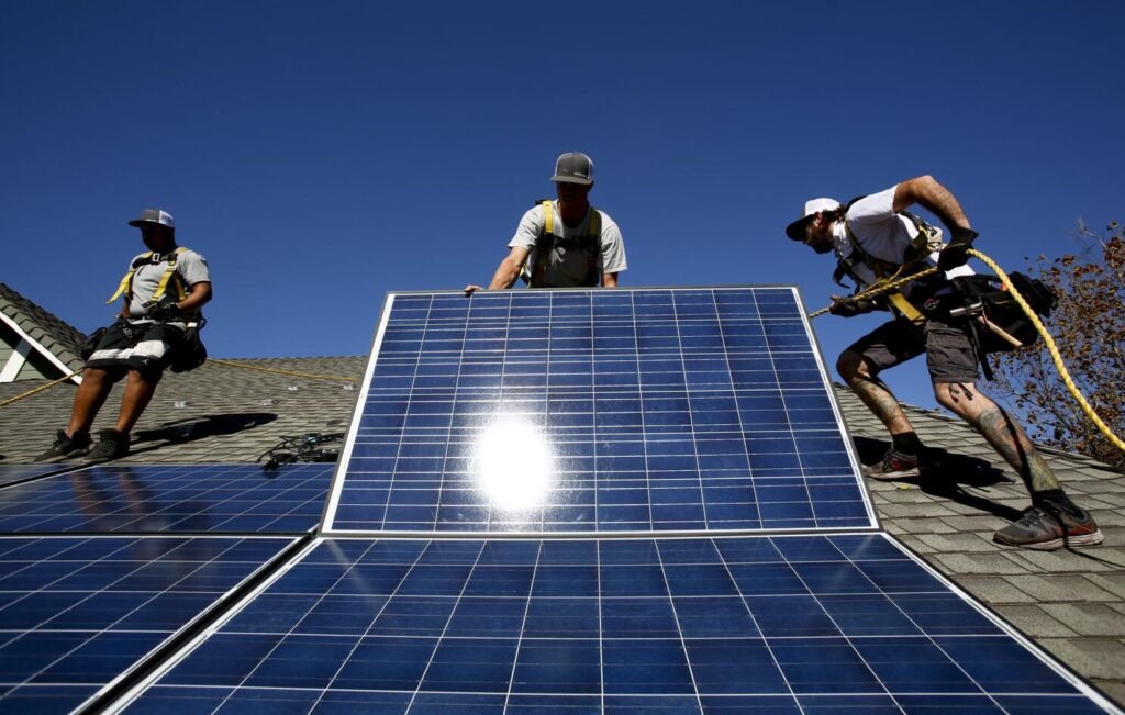 Solar panel installation on a Glendale, CA home with mountains in the background